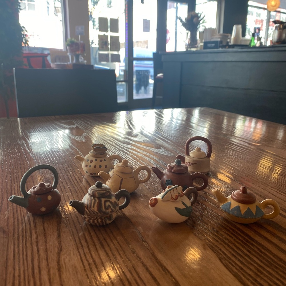 Set of 8 Miniature pottery Teapots